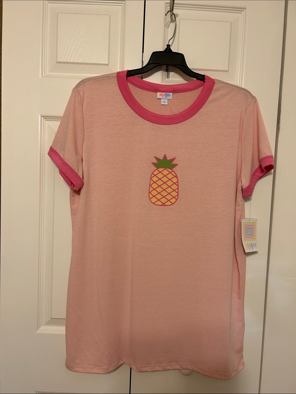 LuLaRoe Light Pink Shirt with Hot Pink Trim and Pineapple.